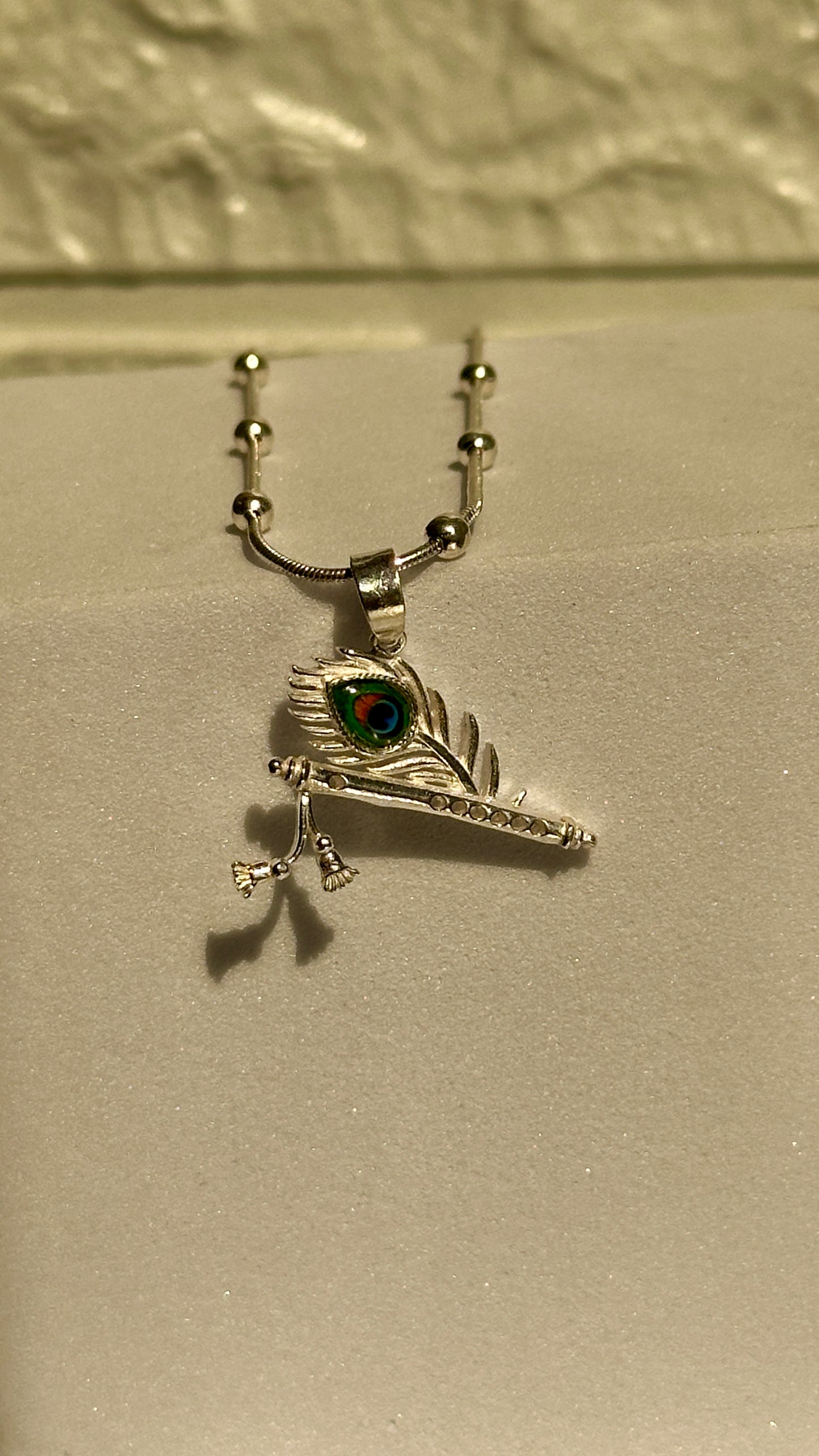 feather & flute locket