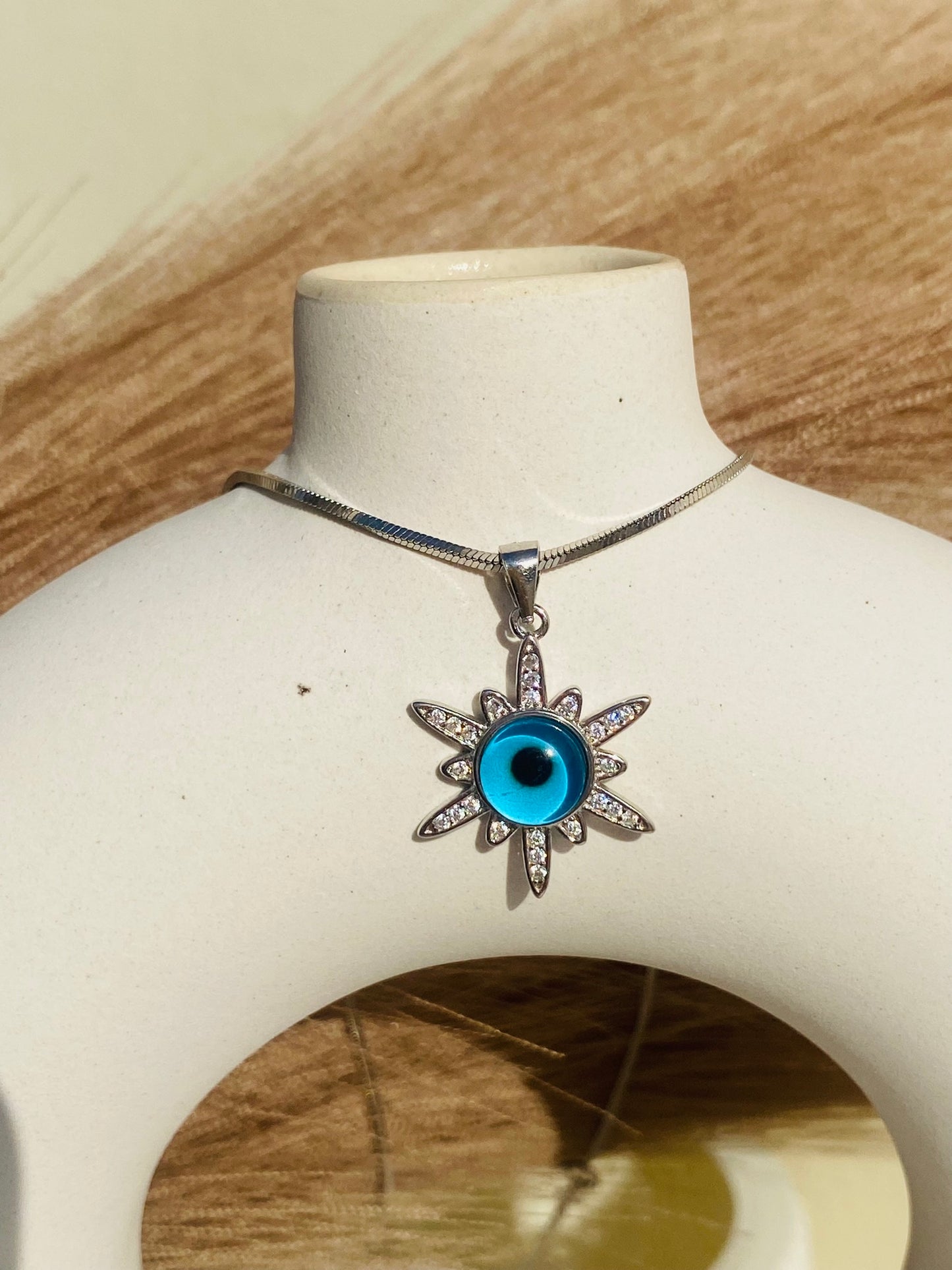 sun's eye neckpiece