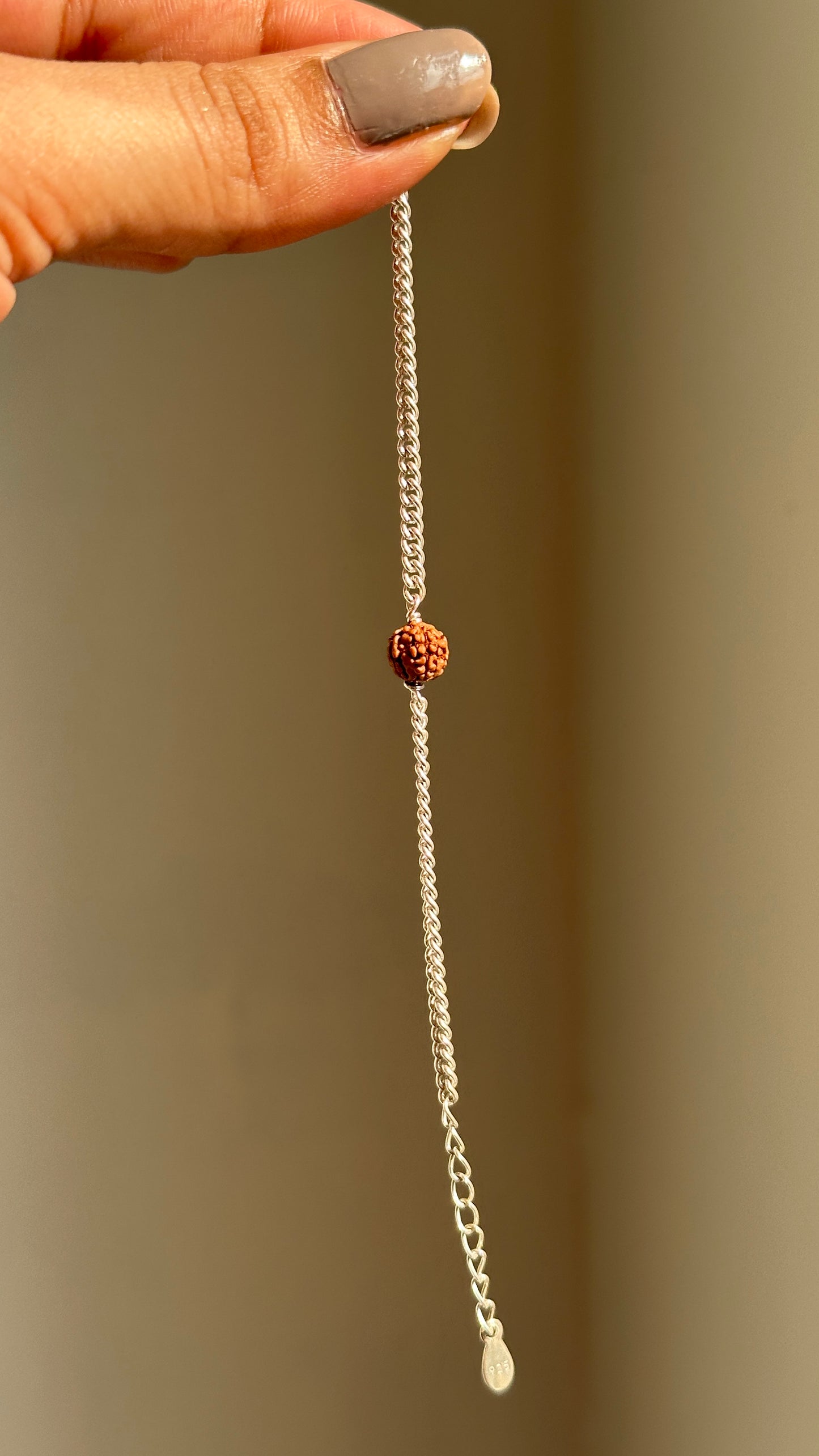 rudra blessing bracelet close-up — rudraksha bead detail