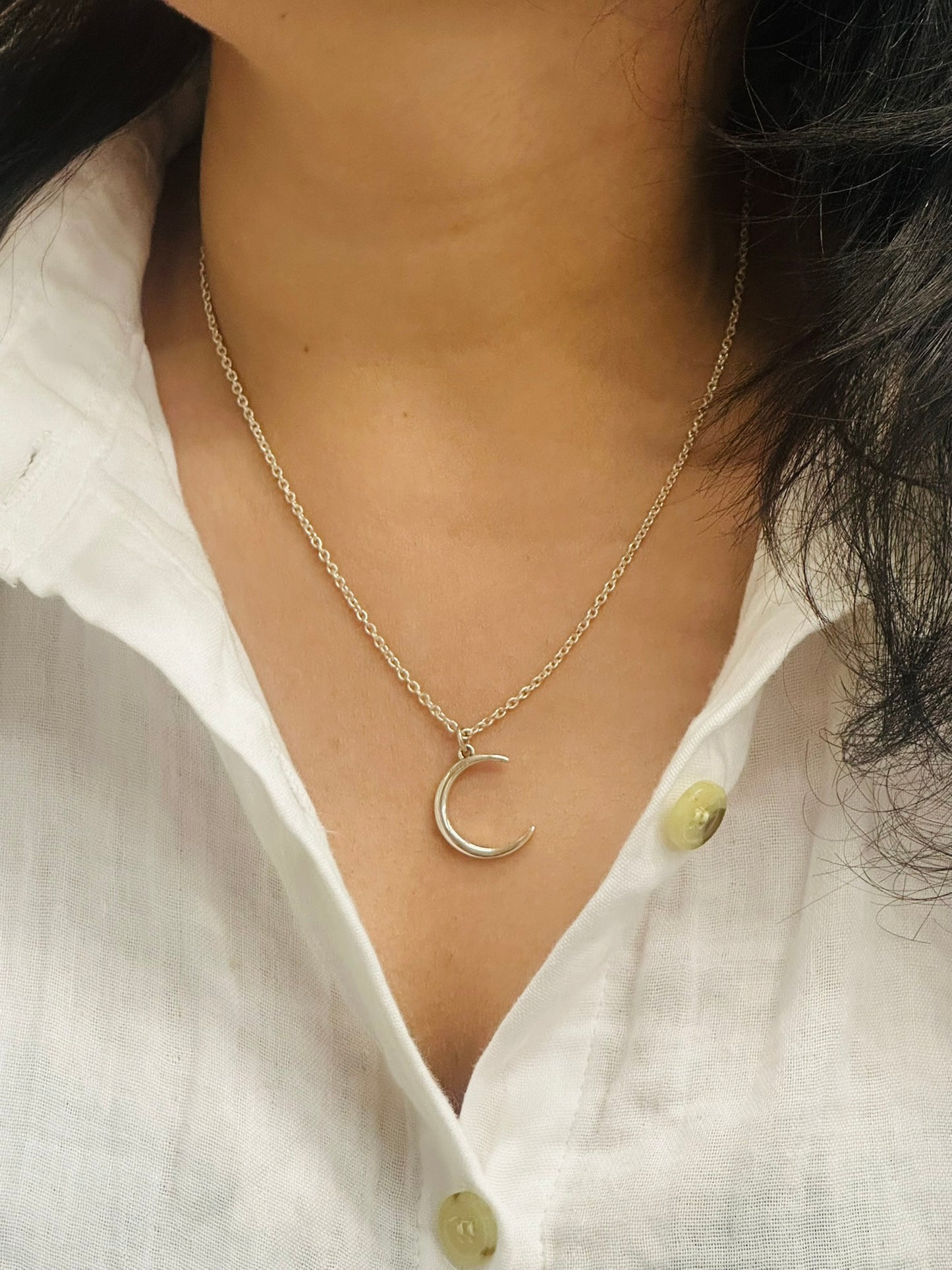 silver crescent neckpiece