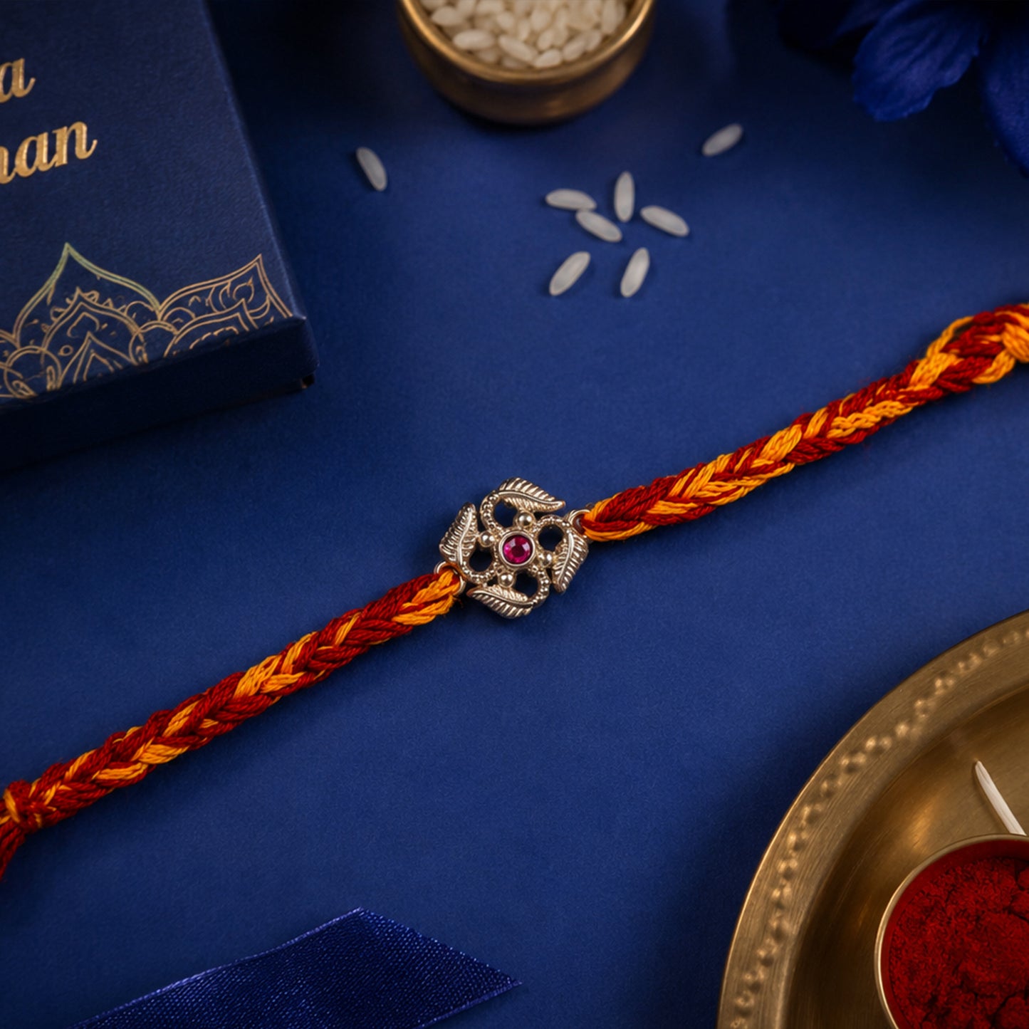 swastik red stone rakhi