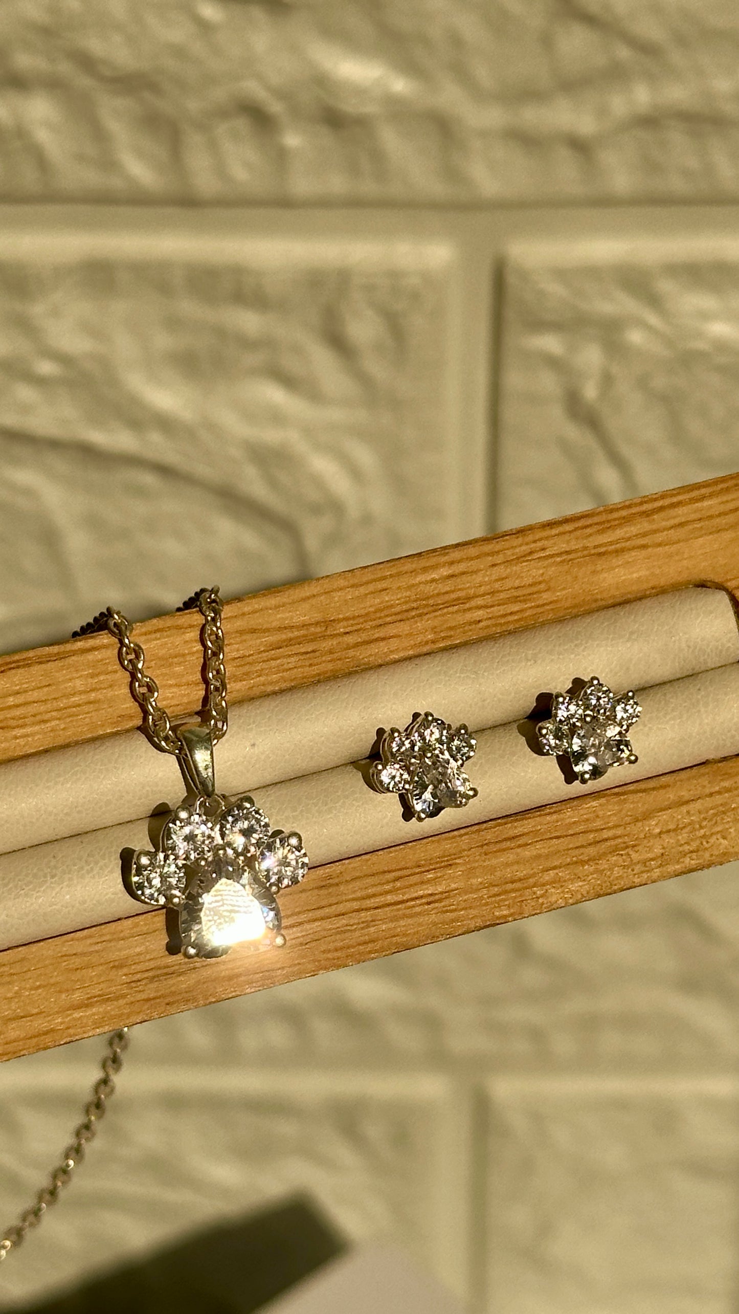crystal paw pendant set