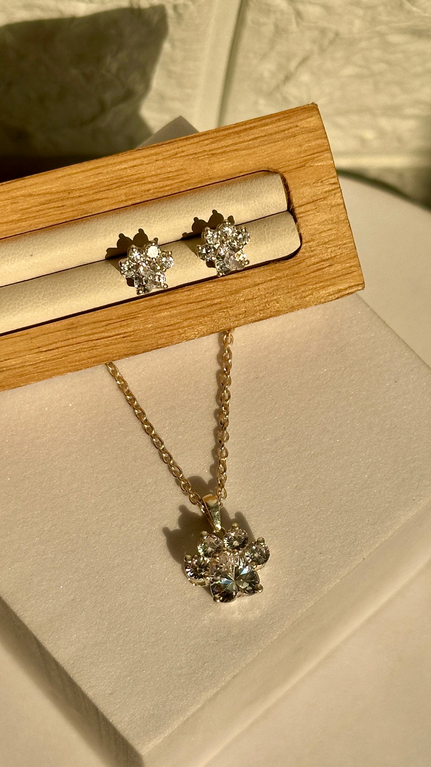 crystal paw pendant set