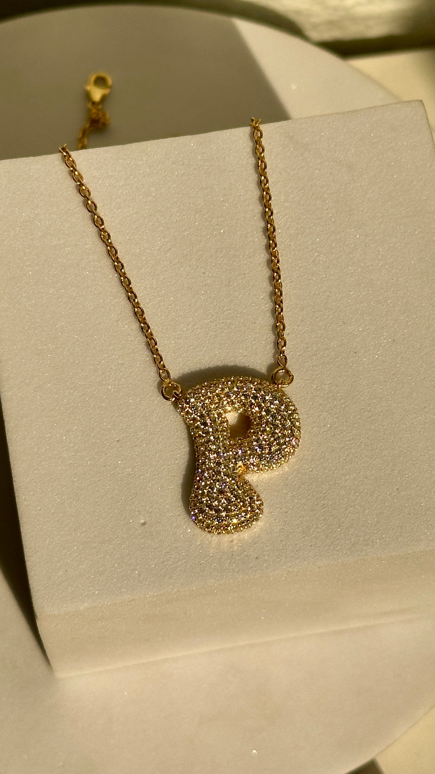 initial bubble neckpiece