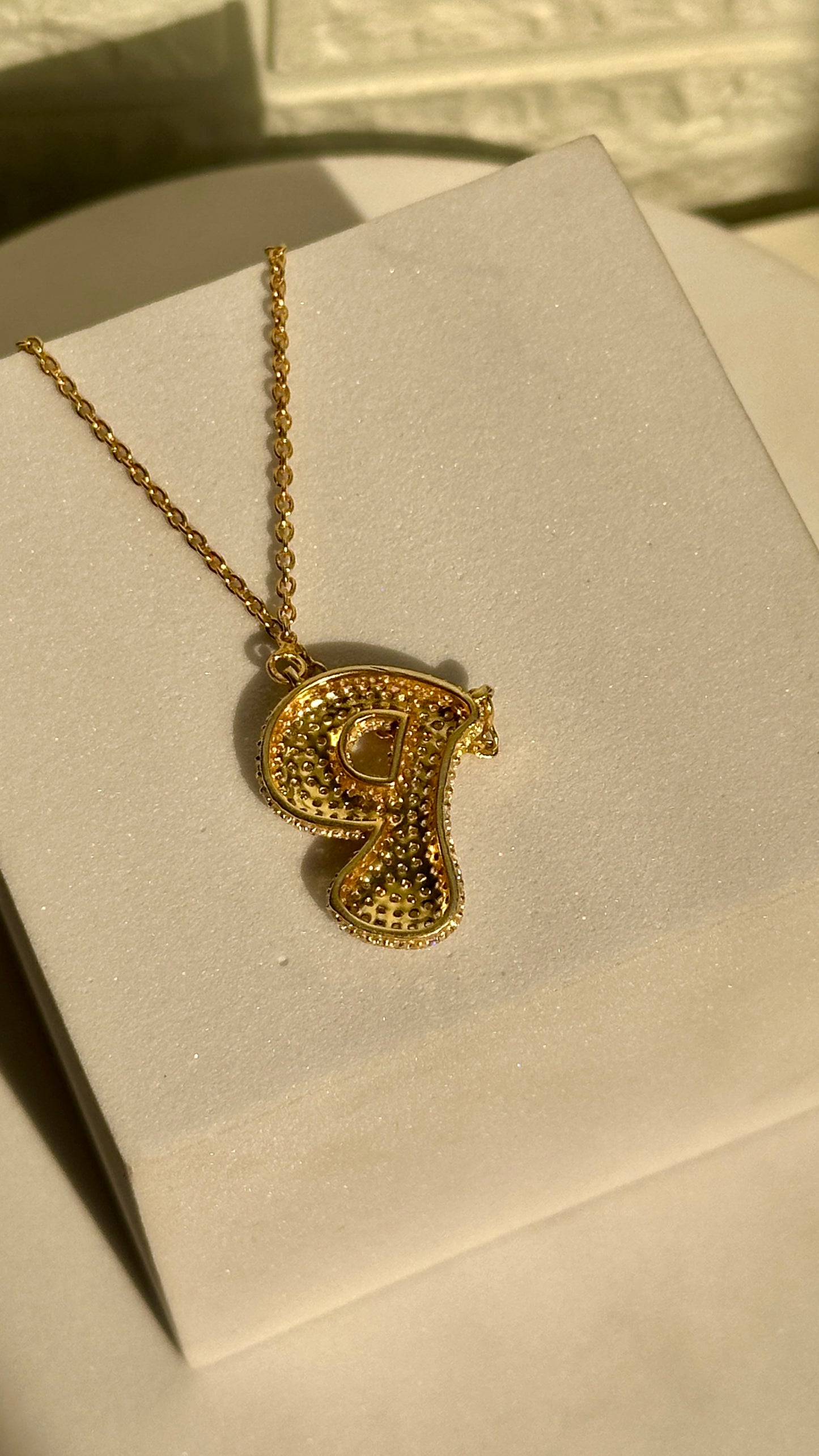 initial bubble neckpiece