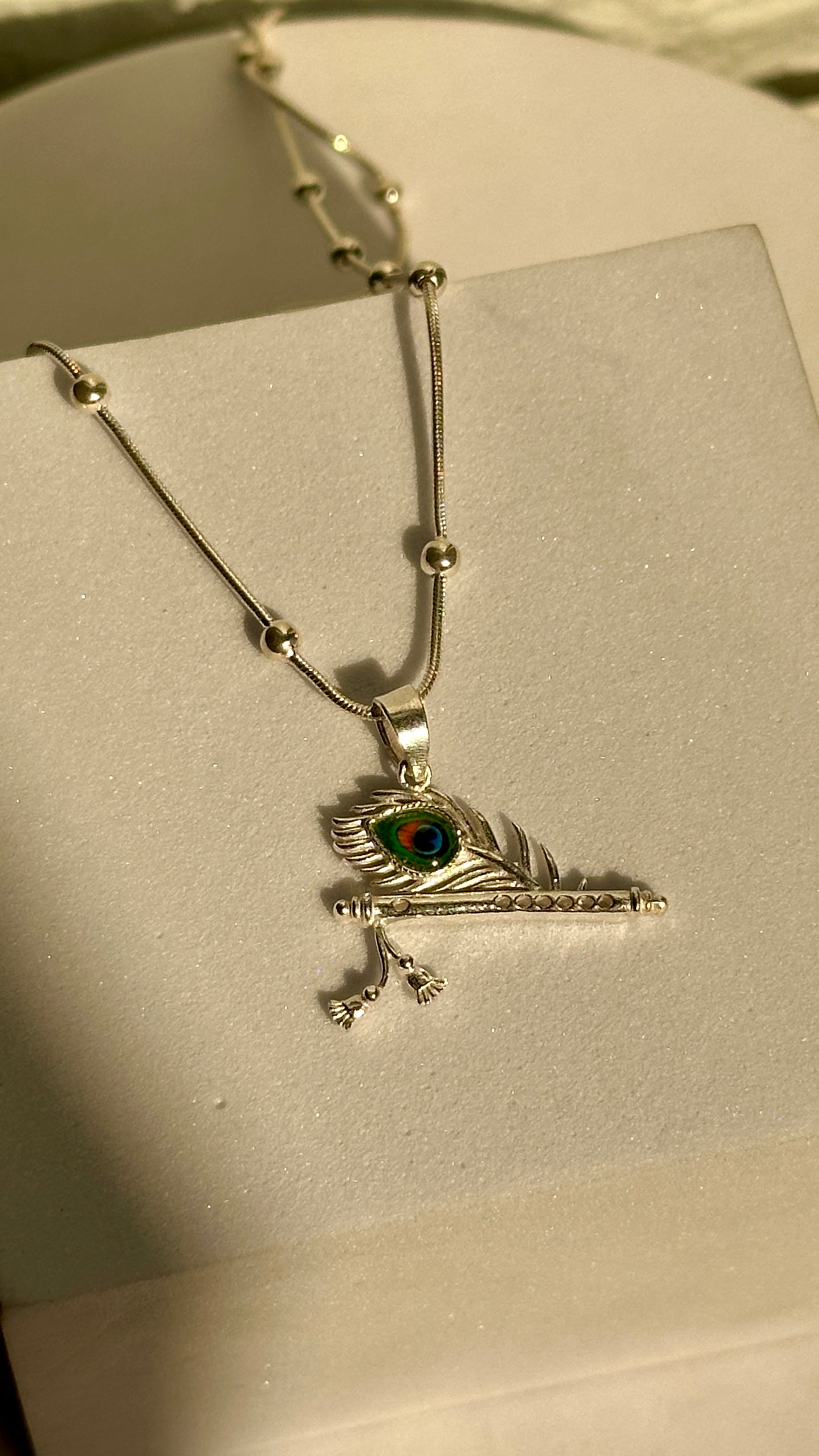 feather & flute locket