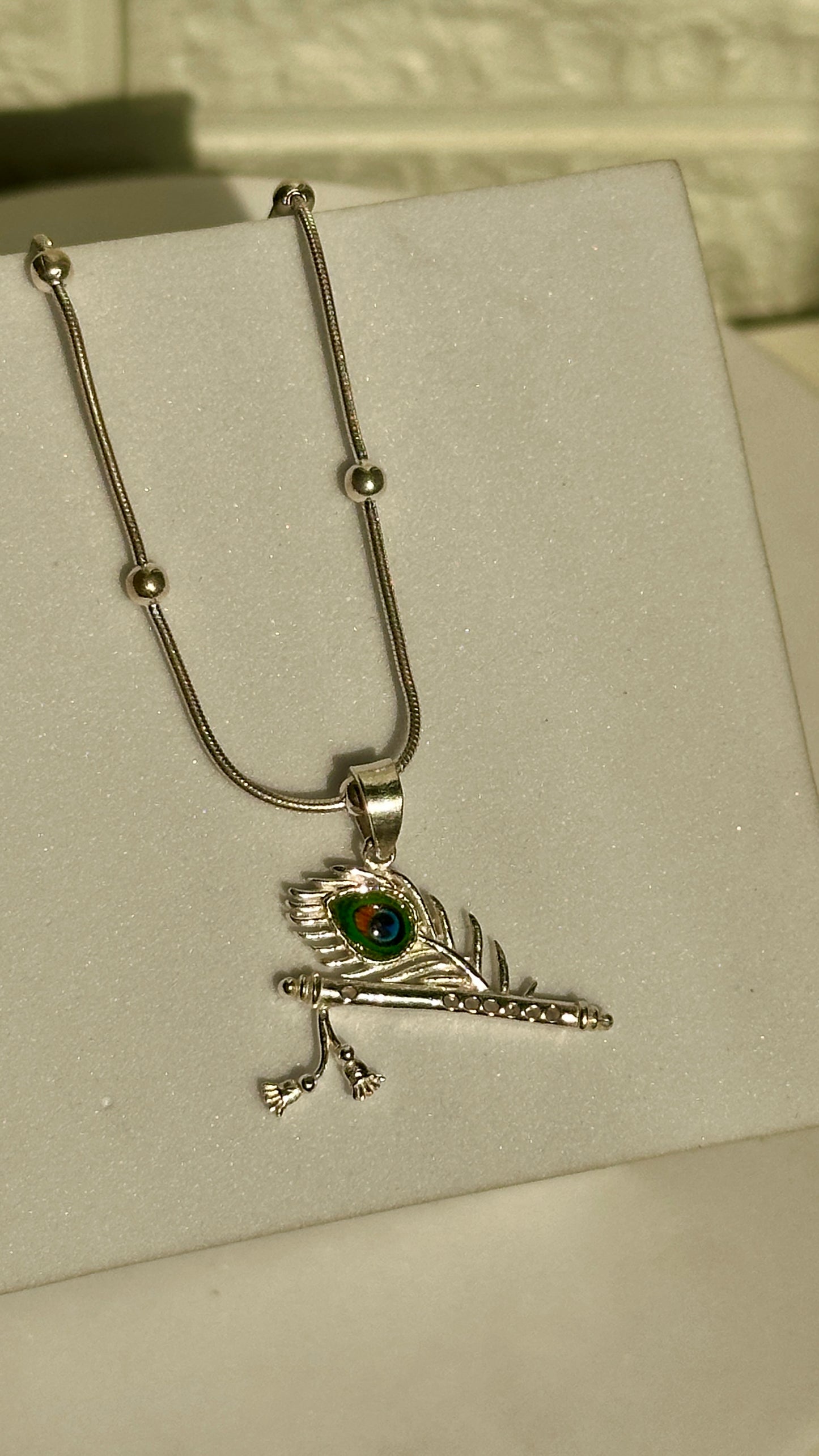 feather & flute locket