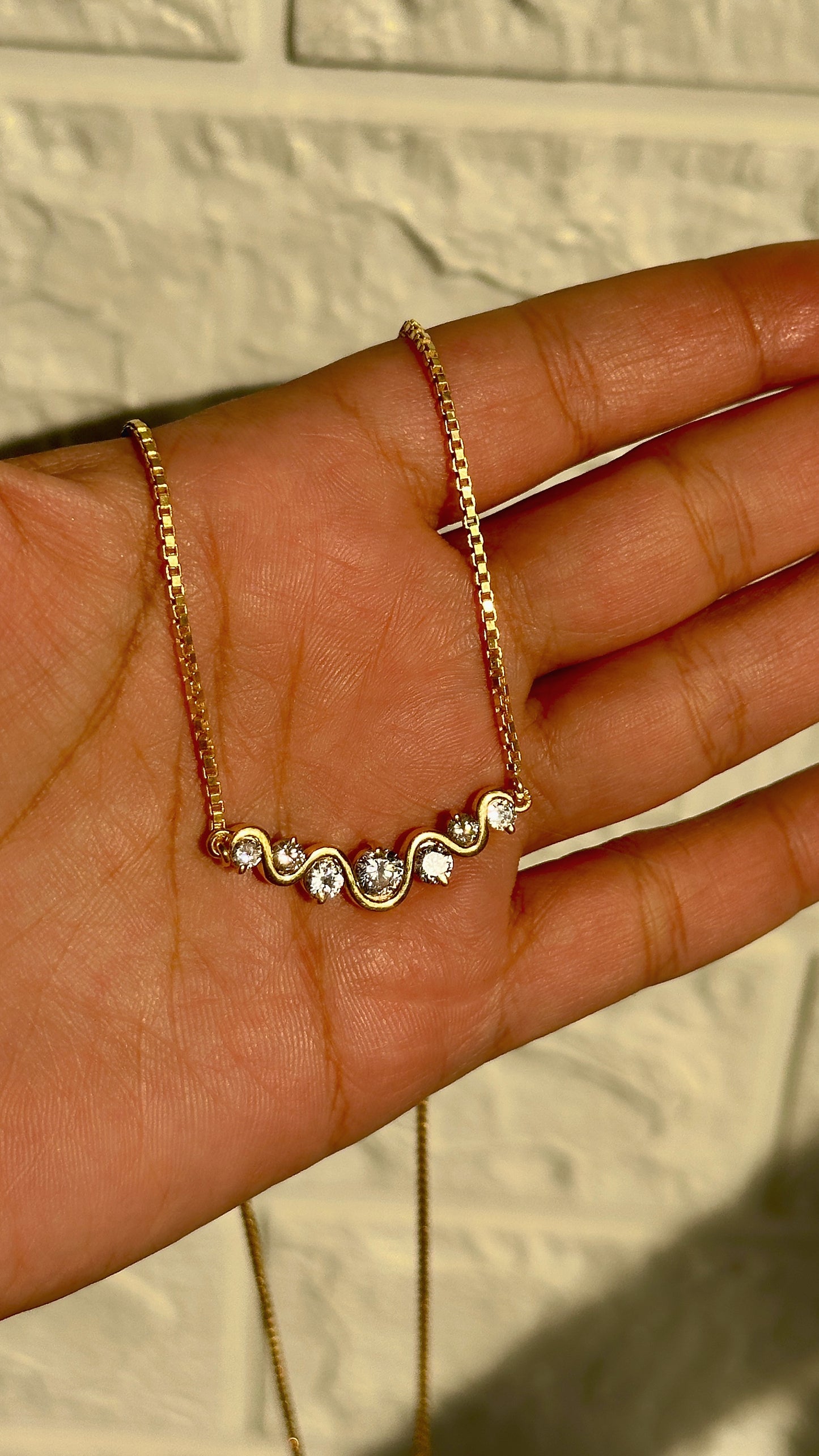 wavy spark neckpiece