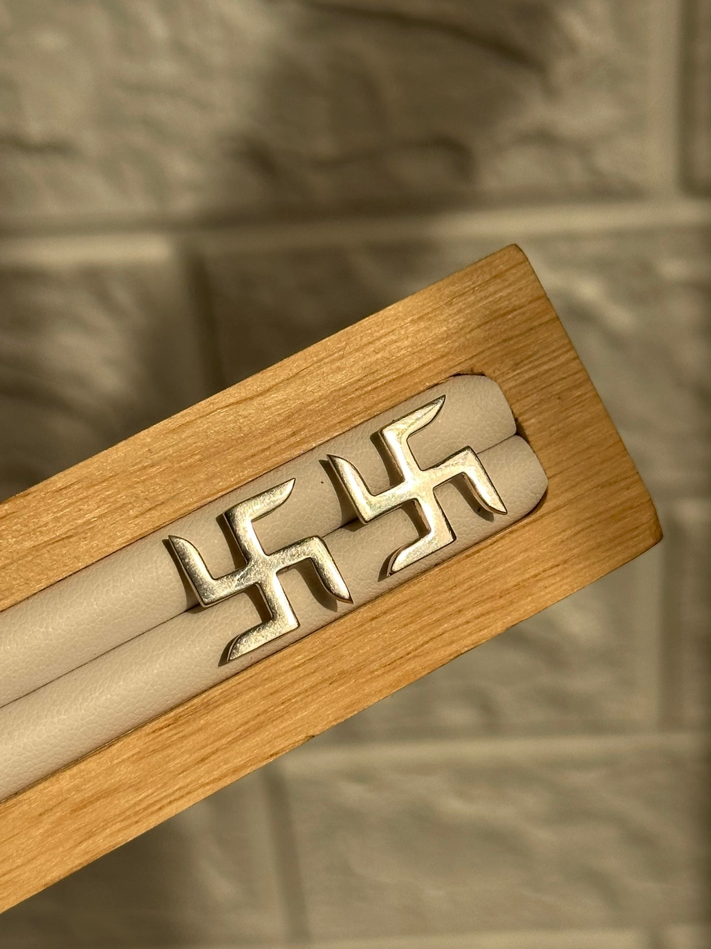 divine swastik studs