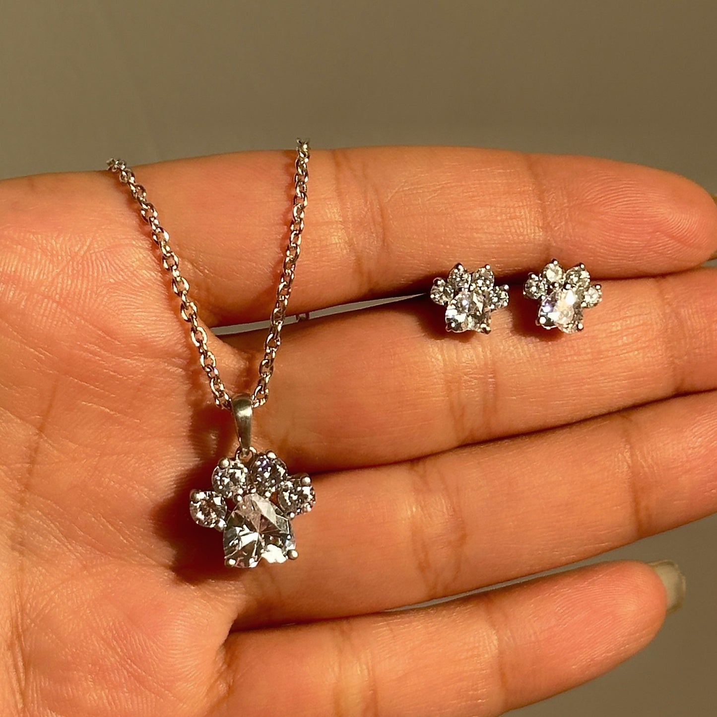 crystal paw pendant set