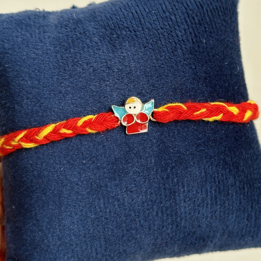 Little Angel Rakhi close-up — enamel angel motif detail
