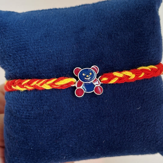 Teddy Bear Rakhi close-up — enamel teddy bear motif detail