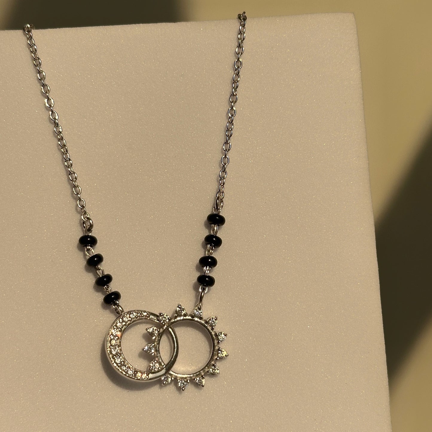 twin eclipse mangalsutra — intertwined zircon motif in 925 sterling silver