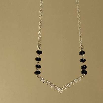 V Spark Mangalsutra worn — 925 silver mangalsutra with black beads