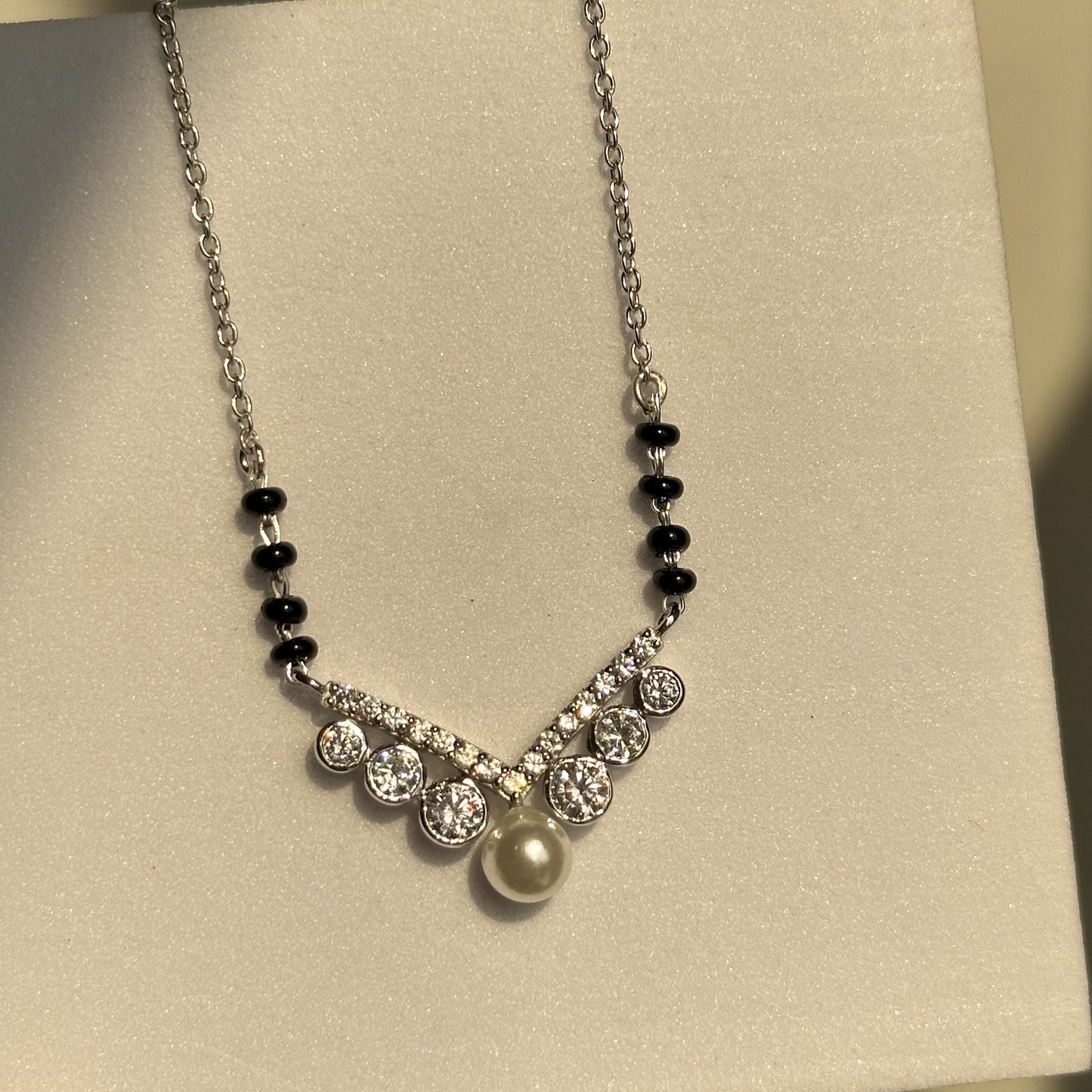 royal pearl mangalsutra worn — 925 silver mangalsutra with black beads