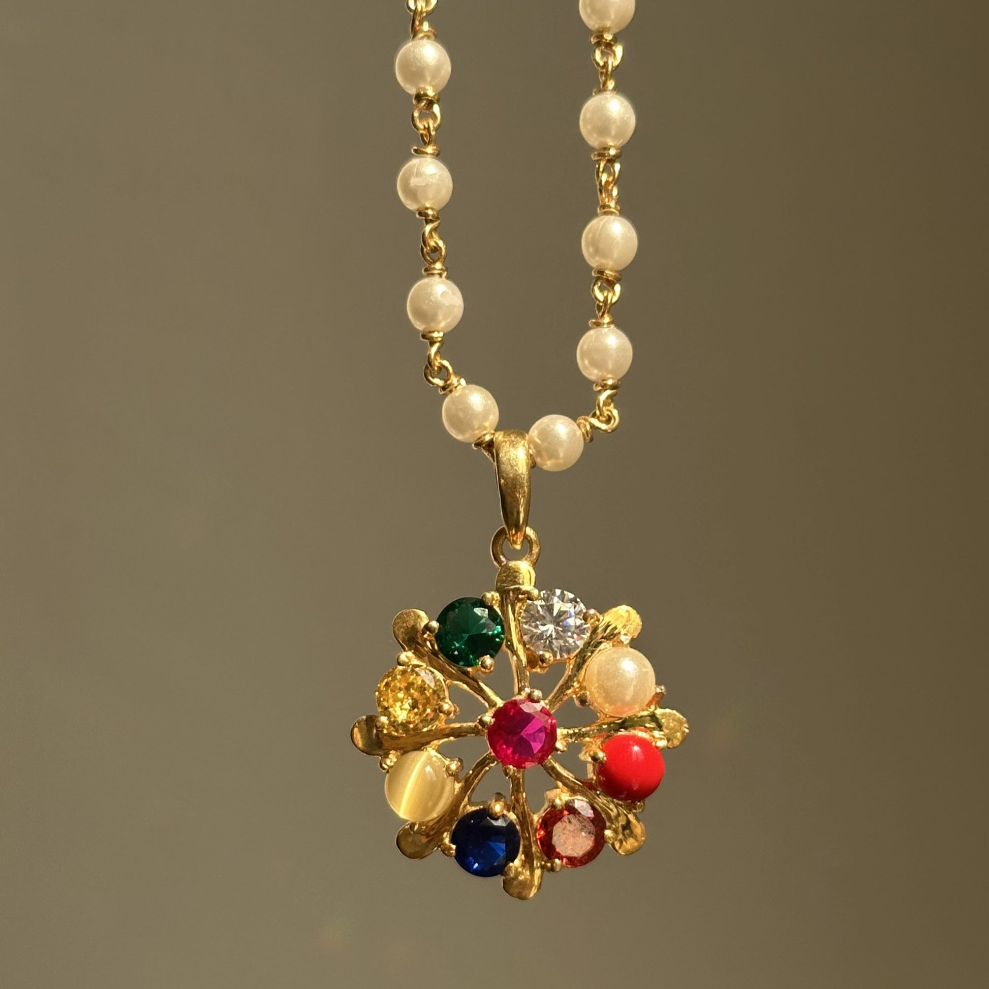 Navratna Pearl Pendant Necklace — nine gems floral pendant on a pearl mala