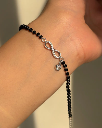 Infinity Drop Hand Mangalsutra — infinity motif with hanging zircon drop