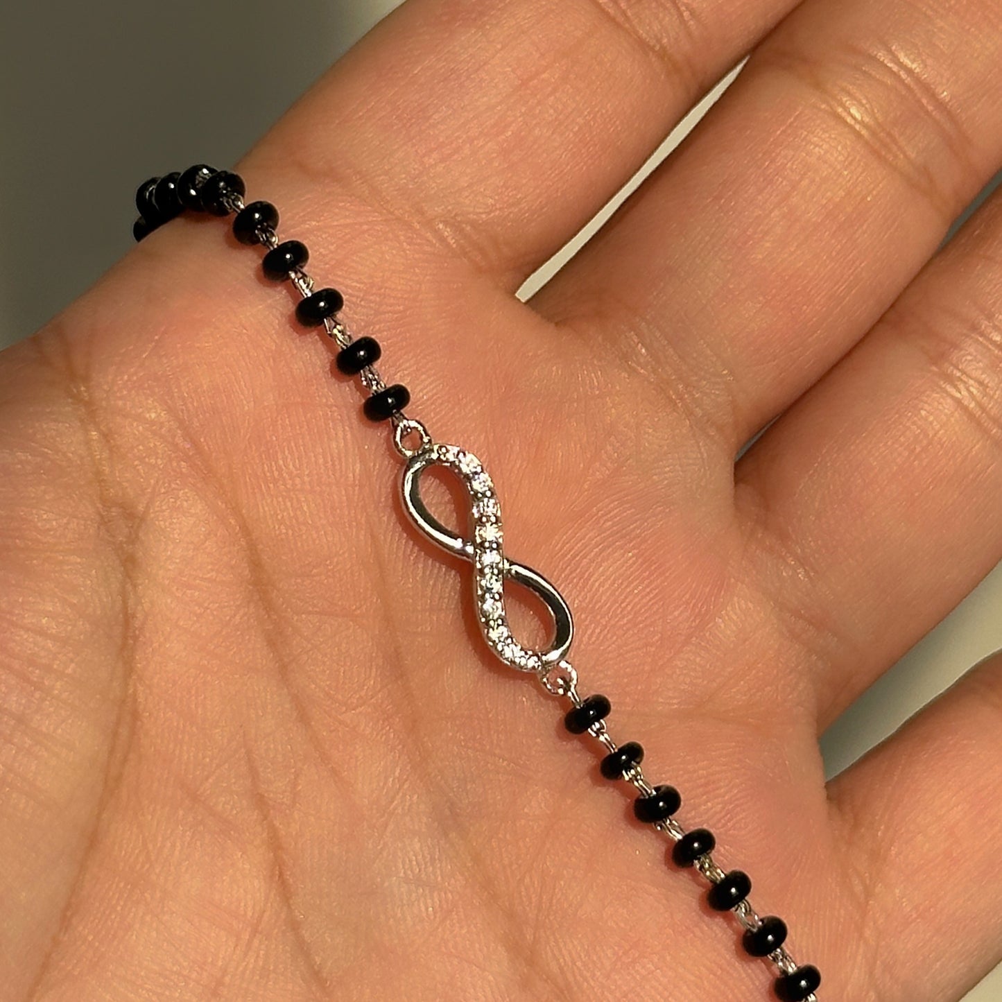 infinity mangalsutra bracelet — infinity motif hand mangalsutra in 925 silver