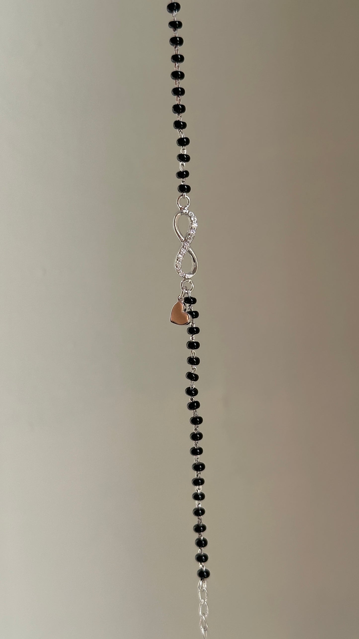 infinity heart mangalsutra bracelet worn — personalised hand mangalsutra