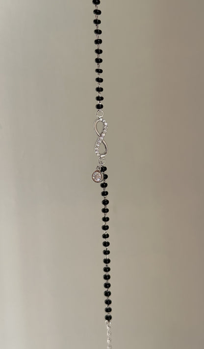 Infinity Drop Hand Mangalsutra close-up — hanging zircon charm detail