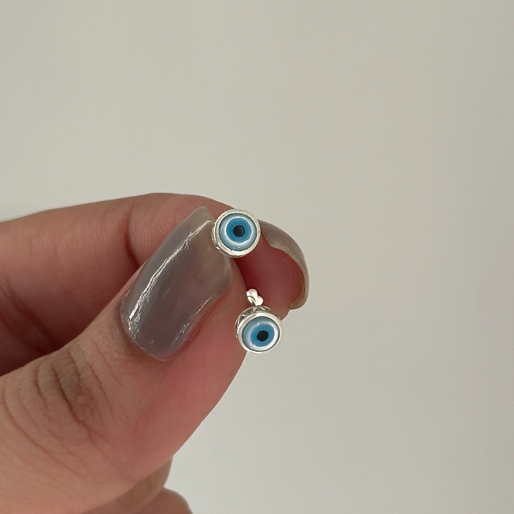 Original Evil Eye Studs close-up — blue evil eye stone detail