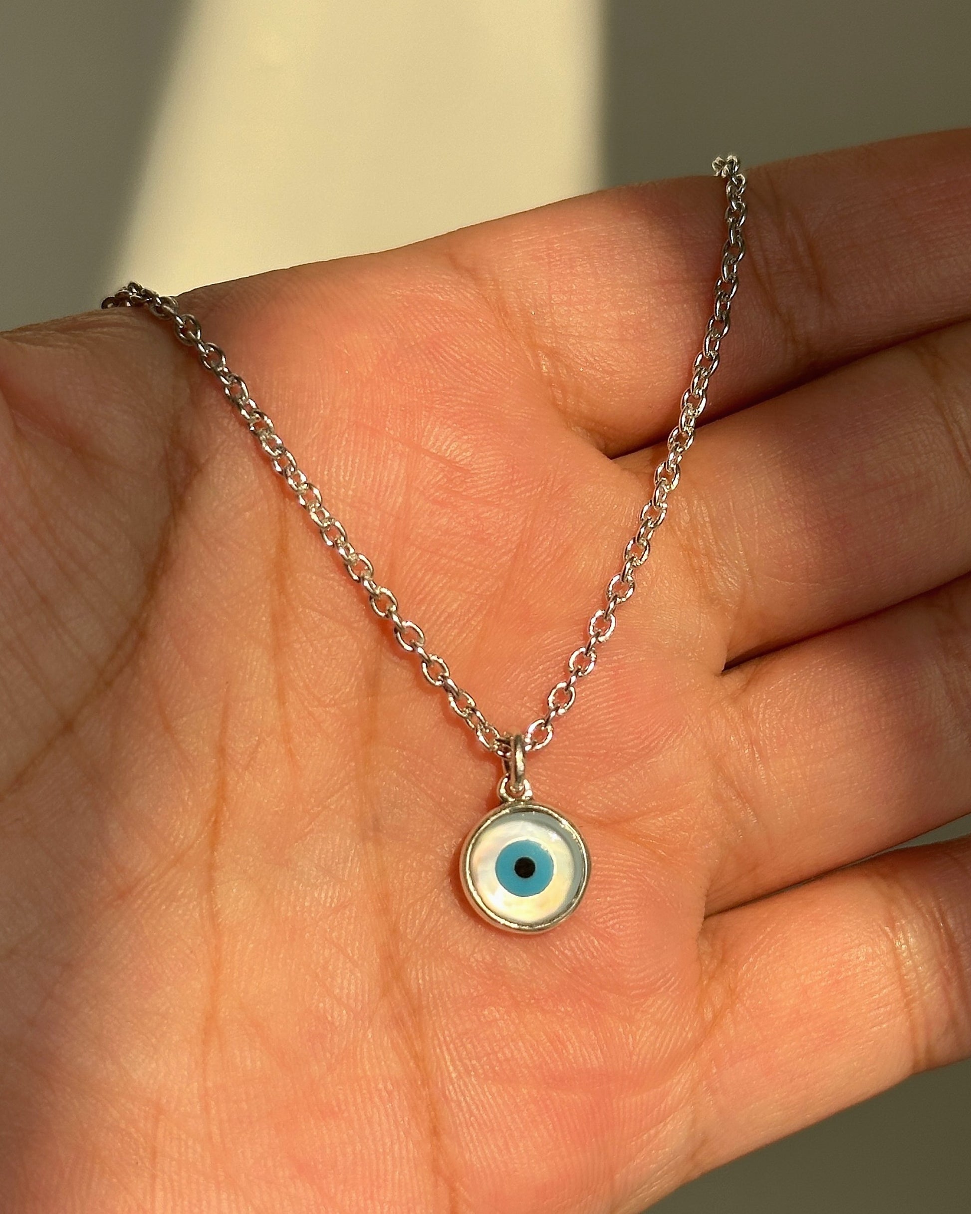 Classic Evil Eye Neckpiece close-up — blue evil eye pendant detail
