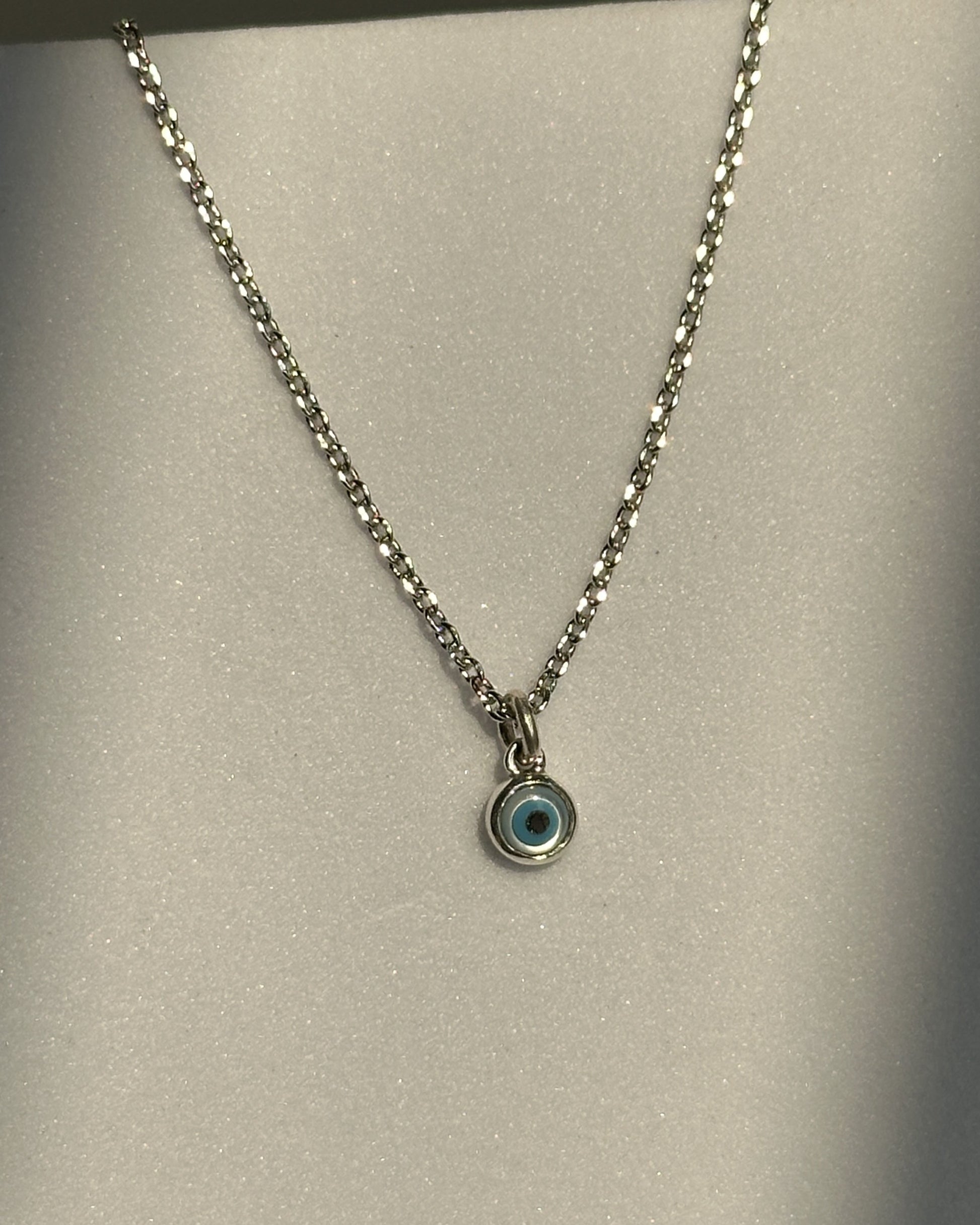 Tiny Evil Eye Neckpiece worn — minimal 925 silver nazariya necklace
