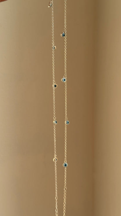 Evil Eye Dangle Anklet close-up — dangling blue evil eye charms