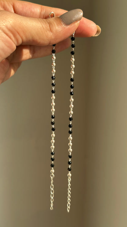 Tiny Black Bead Anklet on a child's ankle — nazariya black bead payal