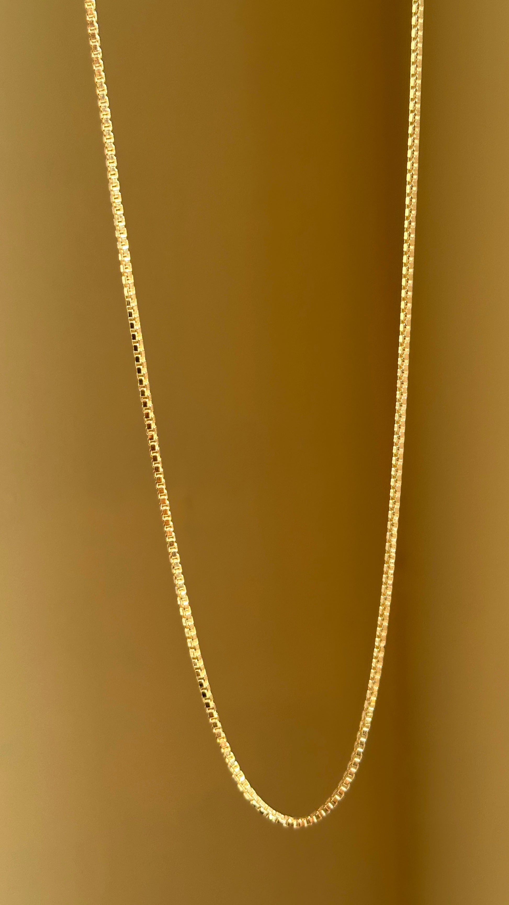 Box Chain close-up — interlocking silver box link detail