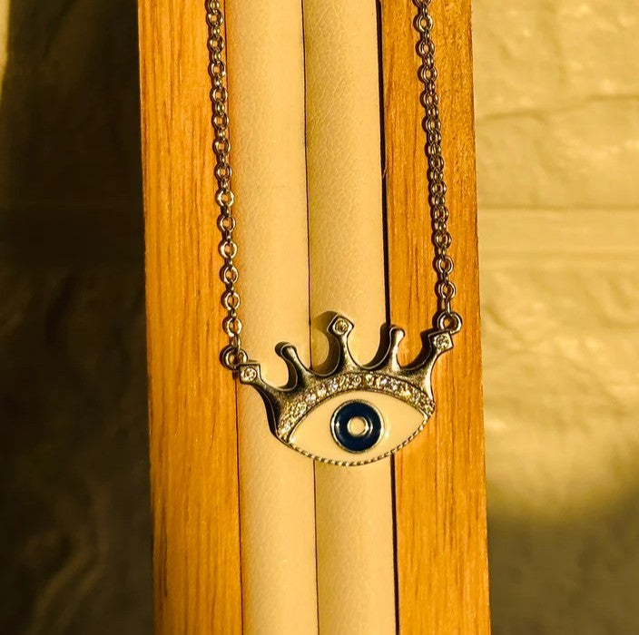 crowned evil eye neckpiece