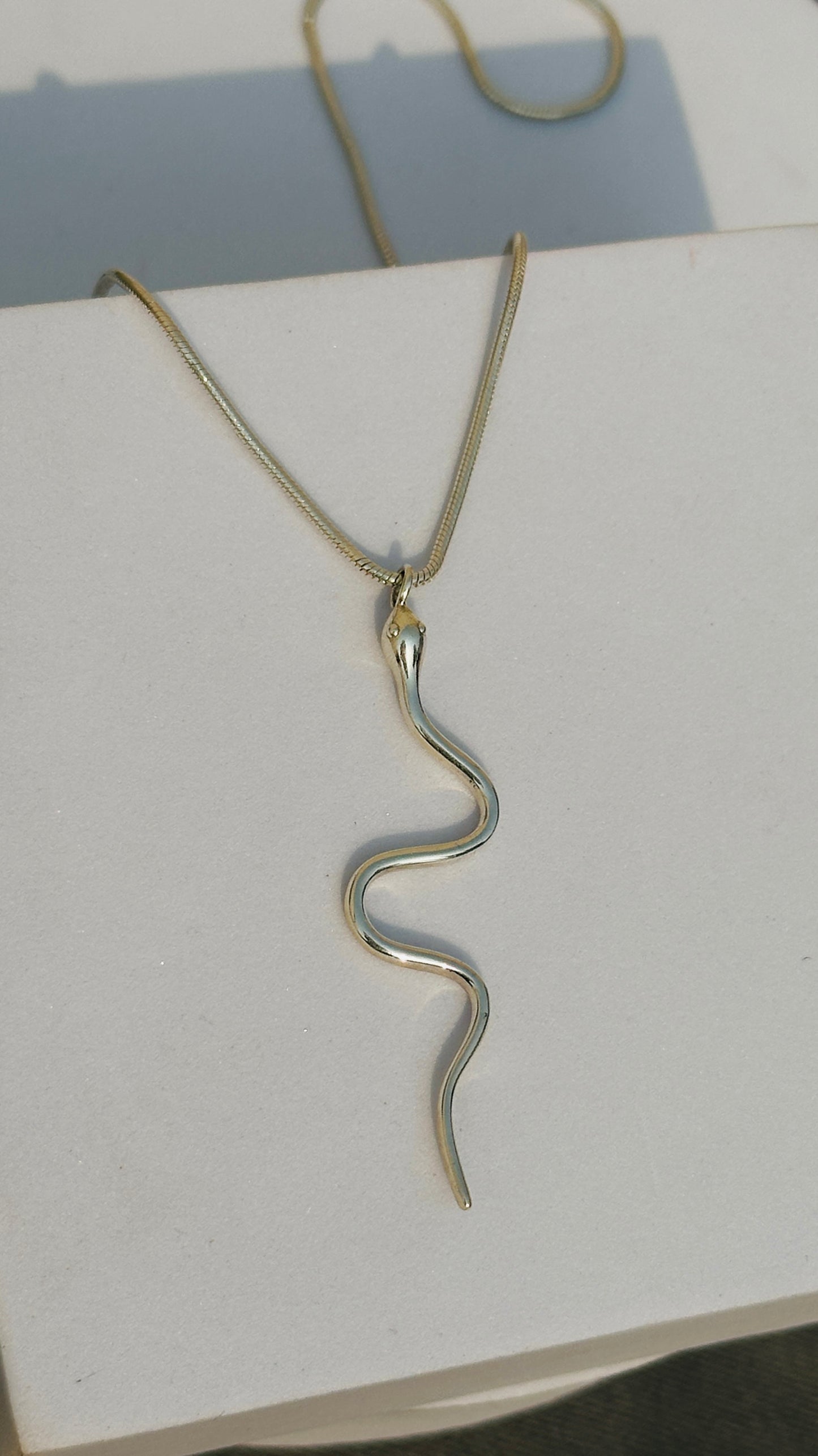 serpent neckpiece
