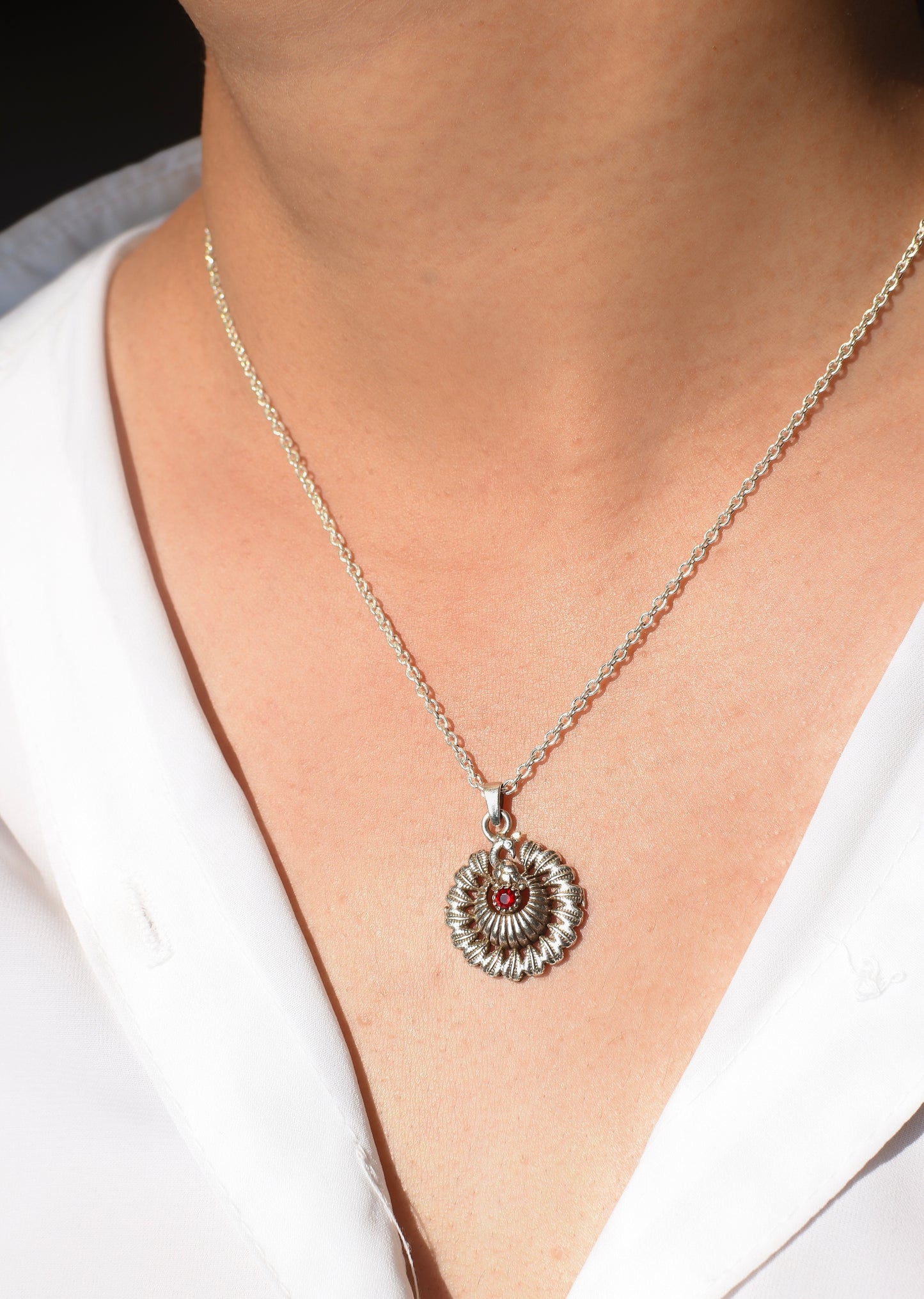 dancing peacock pendant